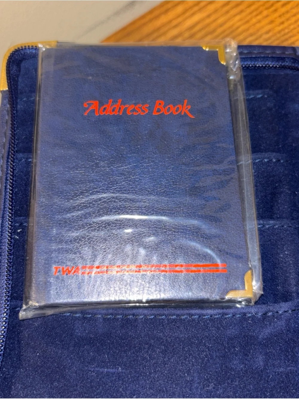 Navy Stripe Passport Holder with Red Logo and Gold Corners TWA